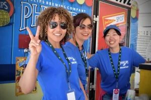 A group photo of volunteers at a TD JazzFest beer garden in 2018